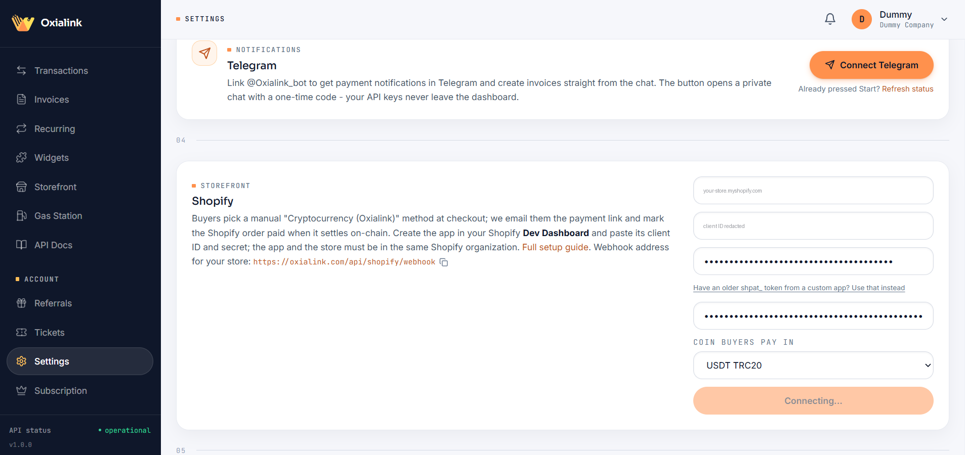 The Shopify section of Oxialink Settings, with the shop domain, credentials and coin picker