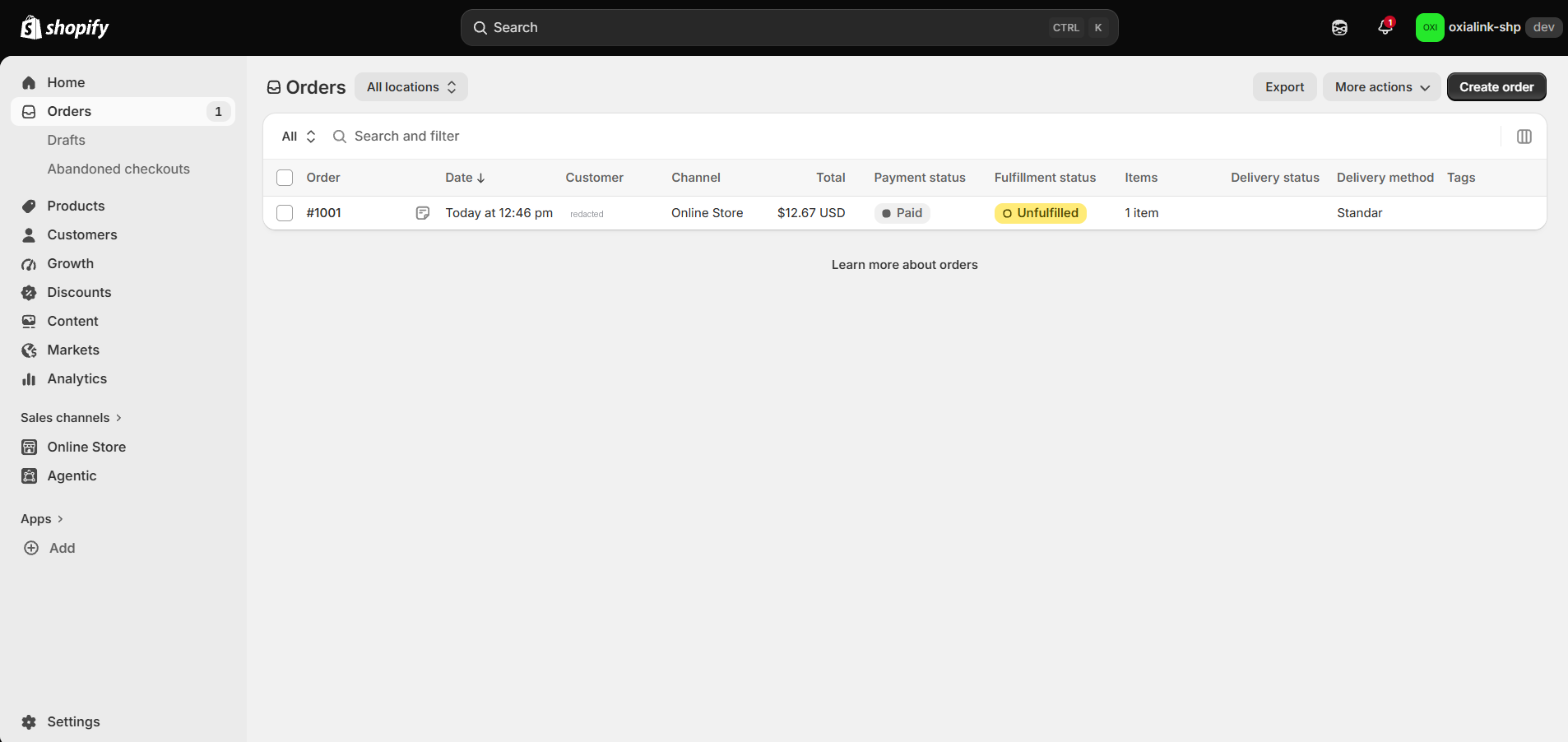 The Shopify orders list showing the order marked Paid